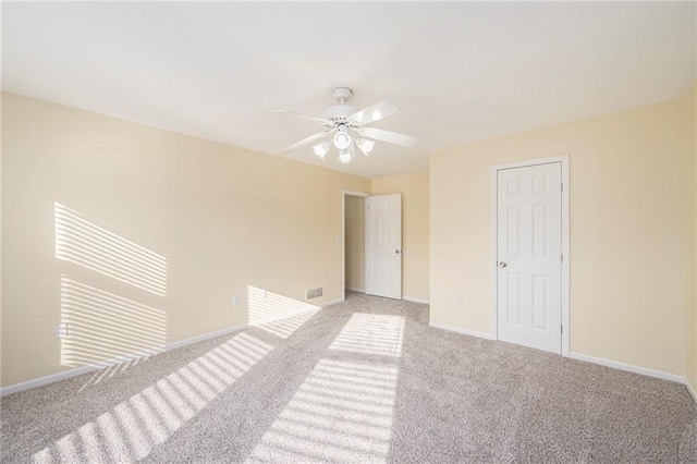 8901 W 128th St, Overland Park, KS 66213 - unfurnished room featuring light carpet, ceiling fan, and baseboards