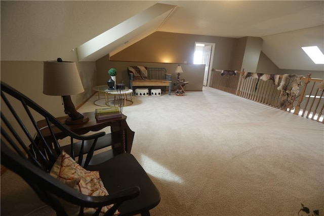 1744 21st Rd, Waverly, KS 66871 - living area featuring a skylight, vaulted ceiling, carpet floors, and an upstairs landing