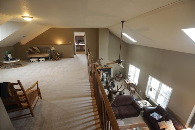 1744 21st Rd, Waverly, KS 66871 - living room featuring lofted ceiling, carpet floors, and ceiling fan