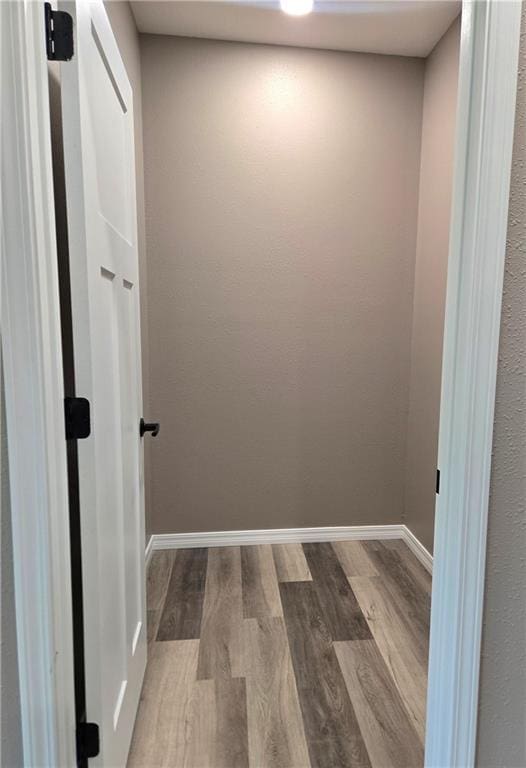 1101 Lakewood Dr, Pittsburg, KS 66762 - unfurnished room with dark wood finished floors and baseboards
