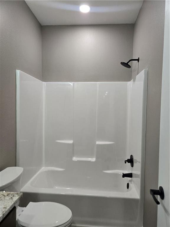 1101 Lakewood Dr, Pittsburg, KS 66762 - bathroom with toilet, tub / shower combination, and vanity