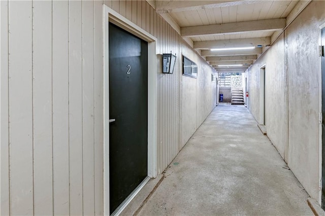 4157 Roanoke Rd Unit 2, Kansas City, MO 64111 - corridor featuring concrete floors and beam ceiling
