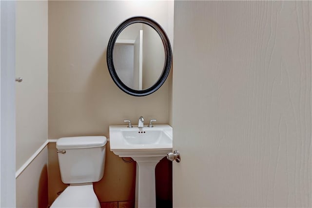 4157 Roanoke Rd Unit 2, Kansas City, MO 64111 - bathroom featuring toilet and a sink