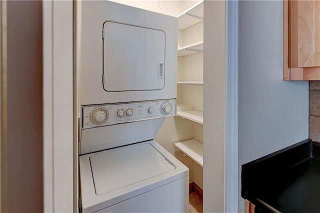 4157 Roanoke Rd Unit 2, Kansas City, MO 64111 - laundry area featuring stacked washer and clothes dryer