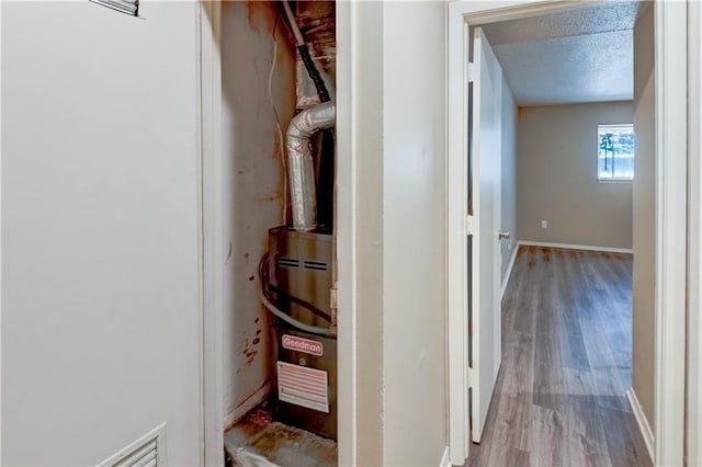 4157 Roanoke Rd Unit 2, Kansas City, MO 64111 - hallway featuring light wood-type flooring and baseboards