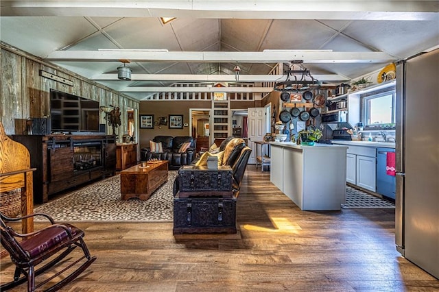 31425 Chance Ave, Warsaw, MO 65355 - living area featuring wood-type flooring and vaulted ceiling