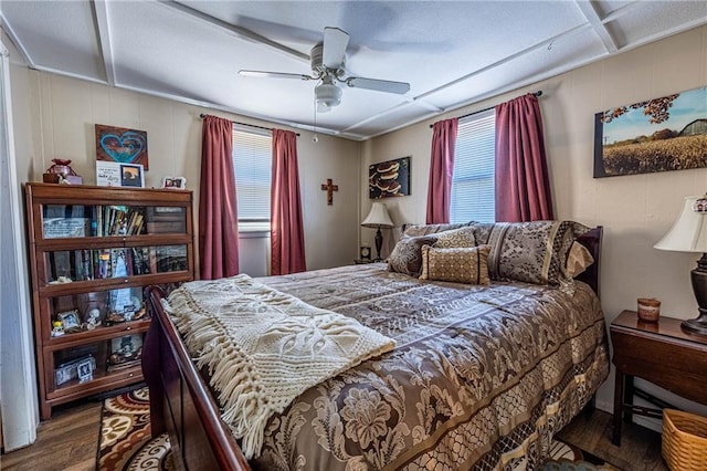 31425 Chance Ave, Warsaw, MO 65355 - bedroom with wood finished floors, ceiling fan, and beamed ceiling
