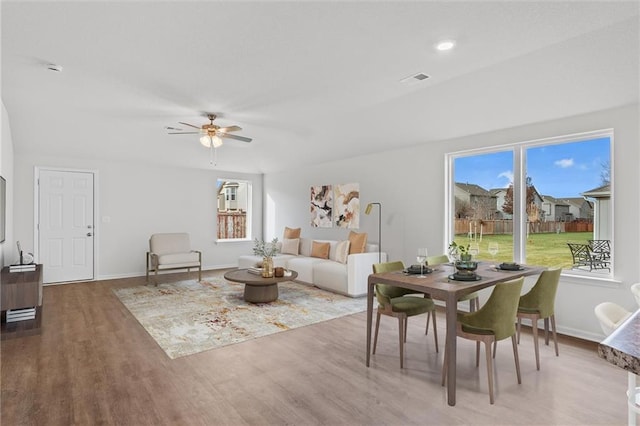 597 W Fountain St, Gardner, KS 66030 - living room featuring wood finished floors, ceiling fan, and baseboards
