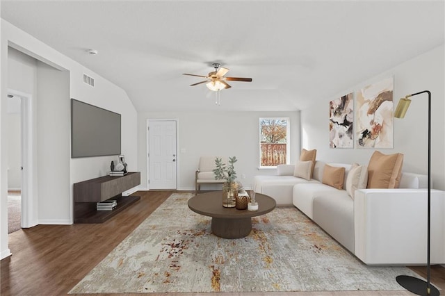 597 W Fountain St, Gardner, KS 66030 - living room featuring wood finished floors, a ceiling fan, and baseboards