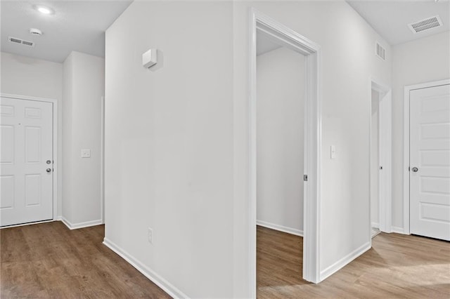 597 W Fountain St, Gardner, KS 66030 - hallway featuring wood finished floors and baseboards