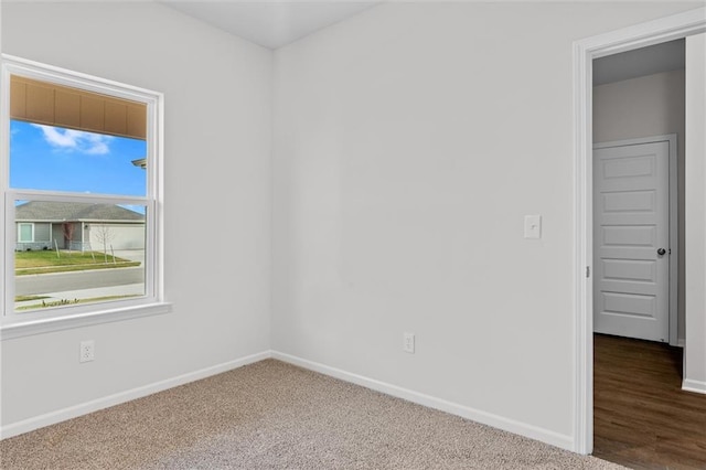 597 W Fountain St, Gardner, KS 66030 - spare room featuring baseboards and carpet floors