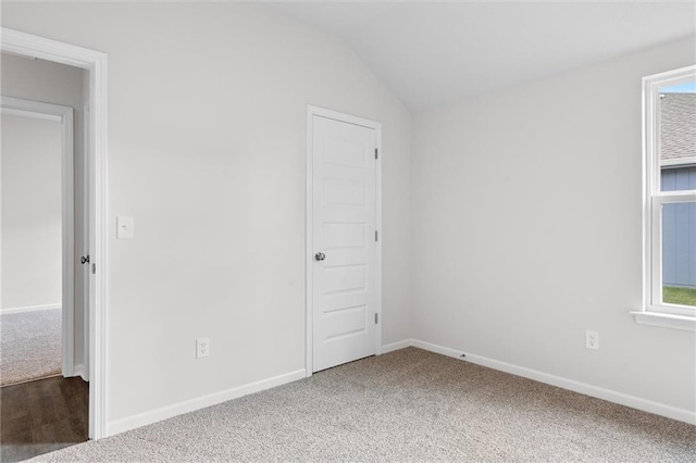597 W Fountain St, Gardner, KS 66030 - unfurnished room with carpet floors, baseboards, and lofted ceiling