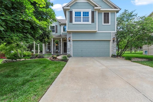 14155 W 147th Ter, Olathe, KS 66062 - view of front of home with stone siding, a front yard, driveway, and an attached garage