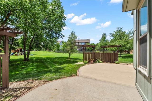 14155 W 147th Ter, Olathe, KS 66062 - view of green lawn featuring a patio, a playground, and a pergola