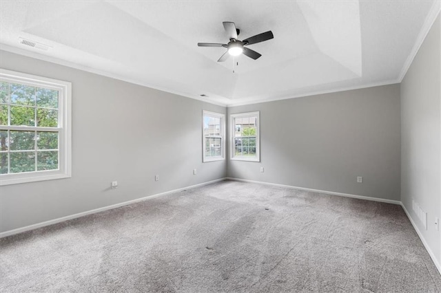 14155 W 147th Ter, Olathe, KS 66062 - spare room with a tray ceiling, carpet floors, crown molding, a ceiling fan, and baseboards