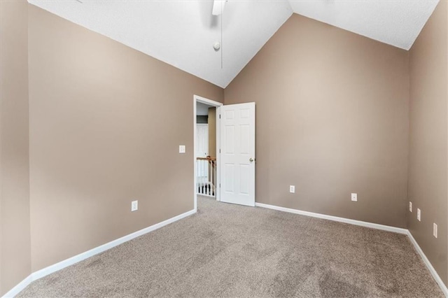 14155 W 147th Ter, Olathe, KS 66062 - spare room featuring carpet, baseboards, ceiling fan, and high vaulted ceiling