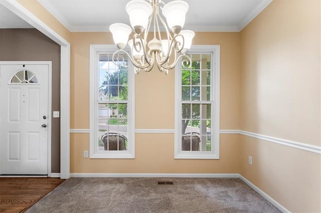 14155 W 147th Ter, Olathe, KS 66062 - entryway featuring a chandelier, plenty of natural light, ornamental molding, and baseboards