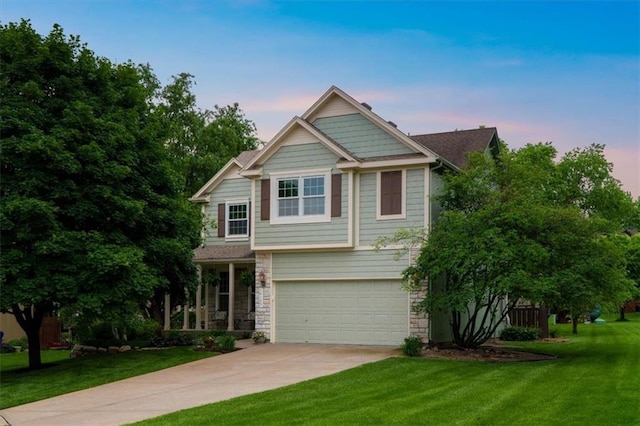 14155 W 147th Ter, Olathe, KS 66062 - craftsman-style home with an attached garage, driveway, a front yard, and stone siding