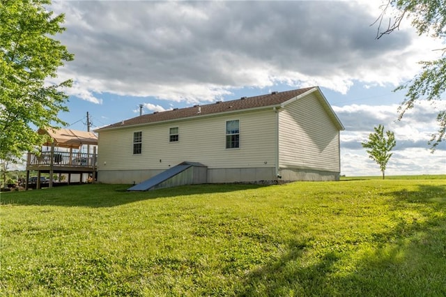 2943 NE Turkey Rd, Breckenridge, MO 64625 - rear view of house with a wooden deck and a yard