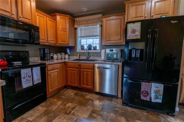 2943 NE Turkey Rd, Breckenridge, MO 64625 - kitchen with black appliances, a sink, dark stone finish floors, and brown cabinets