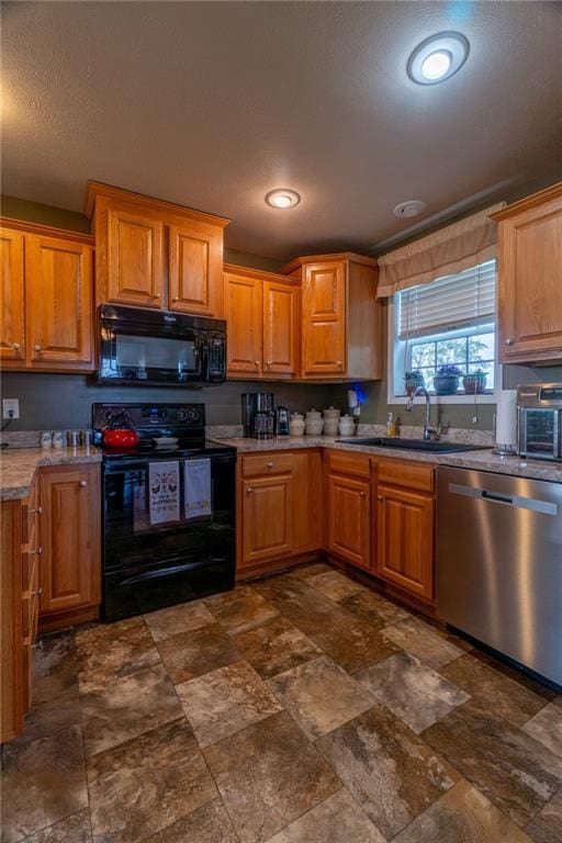 2943 NE Turkey Rd, Breckenridge, MO 64625 - kitchen featuring black appliances, a sink, dark stone finish flooring, brown cabinetry, and recessed lighting