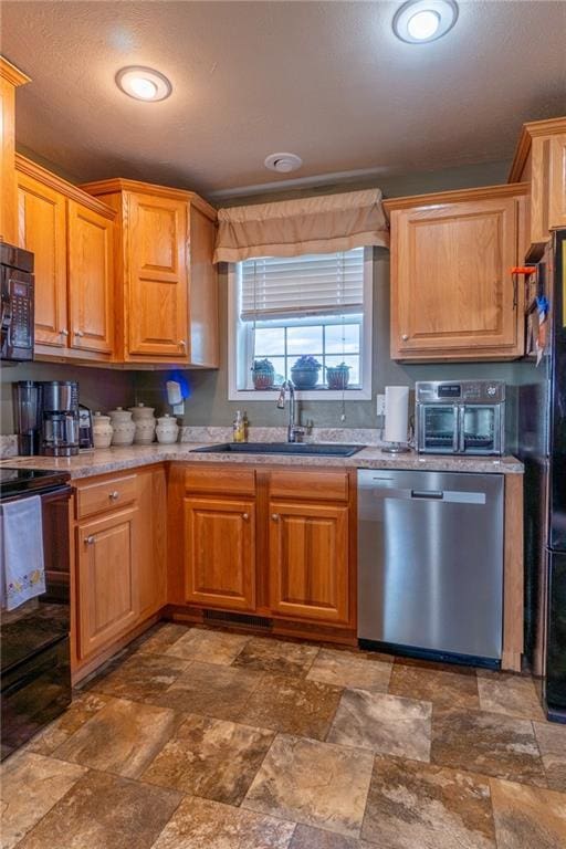 2943 NE Turkey Rd, Breckenridge, MO 64625 - kitchen with black appliances, a sink, and dark stone finish floors