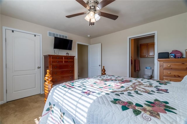 2943 NE Turkey Rd, Breckenridge, MO 64625 - bedroom with light carpet, ceiling fan, and ensuite bath