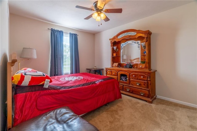 2943 NE Turkey Rd, Breckenridge, MO 64625 - carpeted bedroom with a ceiling fan and baseboards