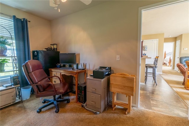 2943 NE Turkey Rd, Breckenridge, MO 64625 - office with ceiling fan, light carpet, and baseboards