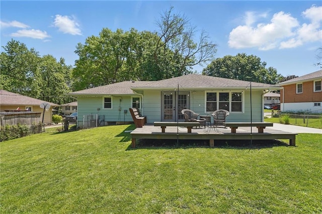 109 N 1st St, Blue Springs, MO 64014 - rear view of house with french doors
