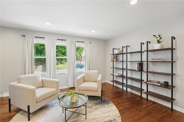 109 N 1st St, Blue Springs, MO 64014 - sitting room featuring healthy amount of natural light, recessed lighting, wood finished floors, and baseboards