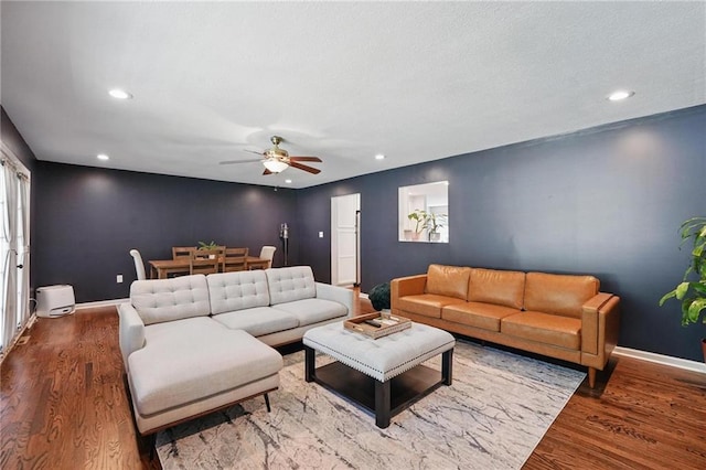 109 N 1st St, Blue Springs, MO 64014 - living area featuring ceiling fan, wood finished floors, recessed lighting, and baseboards