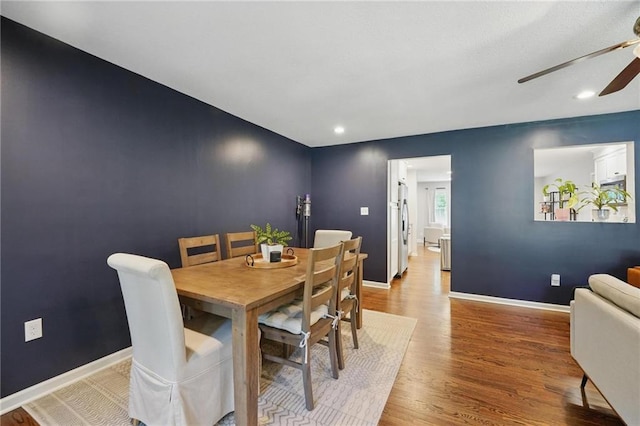 109 N 1st St, Blue Springs, MO 64014 - dining space with a ceiling fan, wood finished floors, baseboards, and recessed lighting