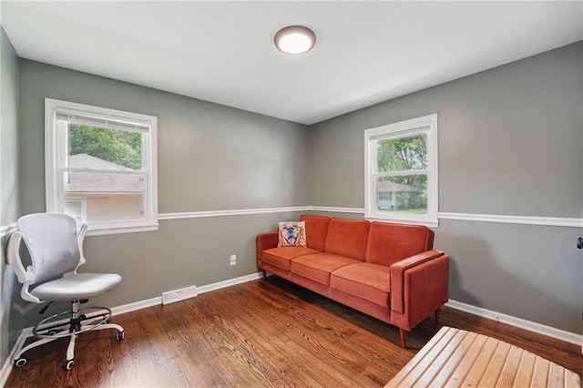 109 N 1st St, Blue Springs, MO 64014 - office with baseboards, wood finished floors, and plenty of natural light