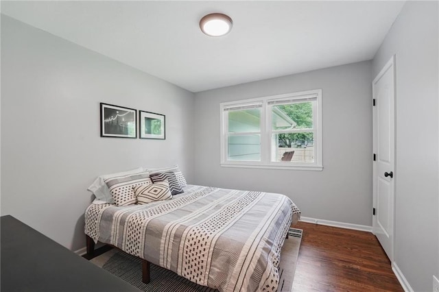 109 N 1st St, Blue Springs, MO 64014 - bedroom with wood finished floors and baseboards