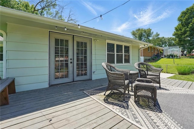 109 N 1st St, Blue Springs, MO 64014 - wooden deck featuring french doors