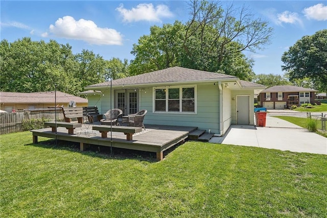 109 N 1st St, Blue Springs, MO 64014 - rear view of property featuring a wooden deck, a shingled roof, and outdoor lounge area