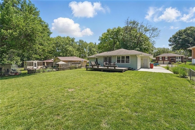 109 N 1st St, Blue Springs, MO 64014 - view of yard with a wooden deck
