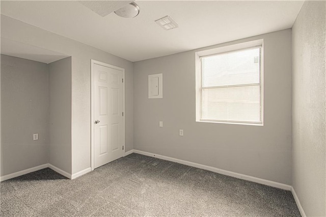 5926 Agnes Ave, Kansas City, MO 64130 - unfurnished bedroom with carpet and baseboards