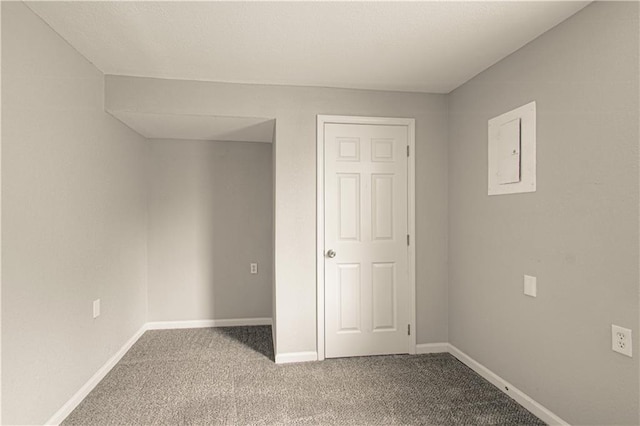 5926 Agnes Ave, Kansas City, MO 64130 - unfurnished bedroom with carpet flooring, baseboards, and electric panel