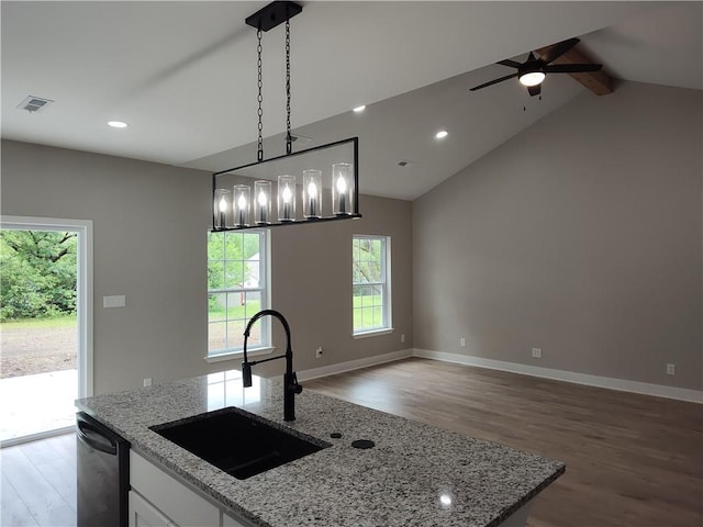 802 E N Main St, Richmond, MO 64085 - kitchen with open floor plan, wood finished floors, recessed lighting, ceiling fan, and a center island with sink