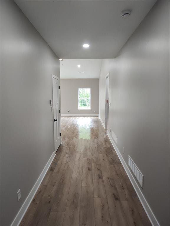802 E N Main St, Richmond, MO 64085 - hall featuring hardwood / wood-style floors and recessed lighting