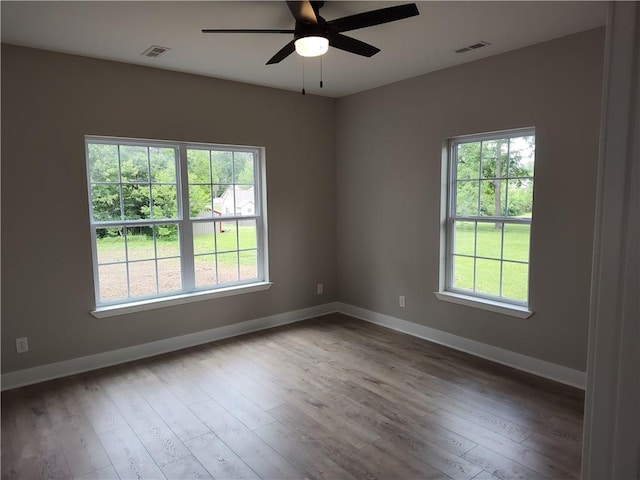 802 E N Main St, Richmond, MO 64085 - spare room with a ceiling fan and wood finished floors
