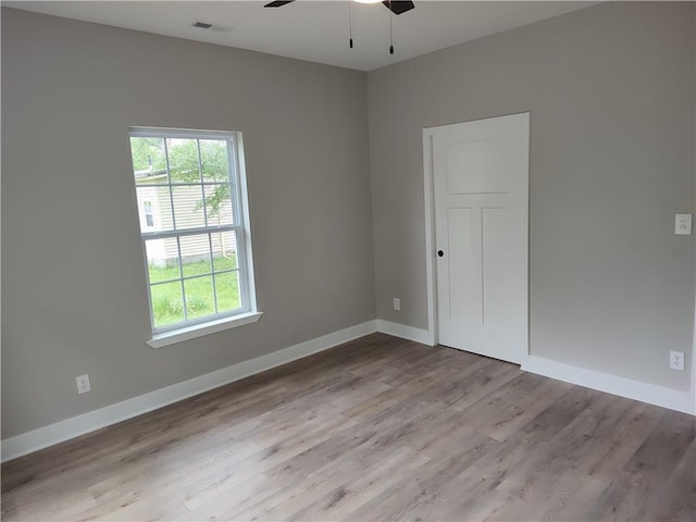 802 E N Main St, Richmond, MO 64085 - unfurnished room featuring ceiling fan and wood finished floors