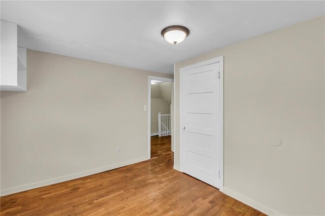 1403 S Sterling Ave, Independence, MO 64052 - unfurnished room with baseboards and light wood-type flooring