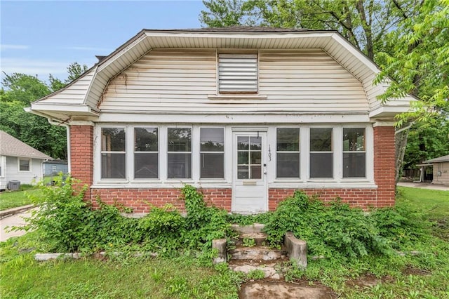 1403 S Sterling Ave, Independence, MO 64052 - view of front of property featuring brick siding and central AC unit