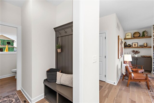20714 Emerald St, Spring Hill, KS 66030 - mudroom featuring light wood-style floors and baseboards