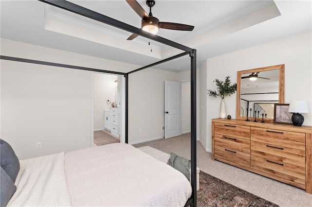 20714 Emerald St, Spring Hill, KS 66030 - bedroom featuring light colored carpet, a raised ceiling, crown molding, baseboards, and ensuite bath