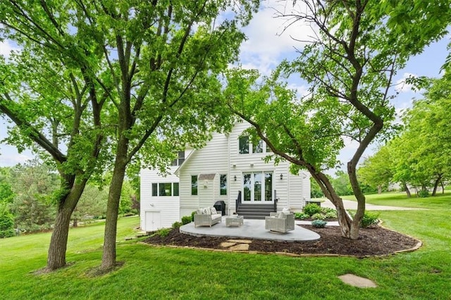 7007 Bell Rd, Shawnee, KS 66217 - back of house with a patio, a lawn, and french doors