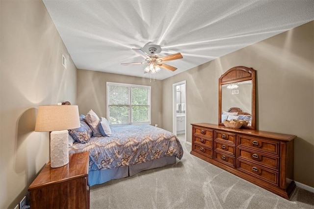 7007 Bell Rd, Shawnee, KS 66217 - carpeted bedroom featuring baseboards, ceiling fan, and connected bathroom